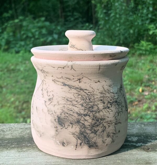 Pink lidded raku jar